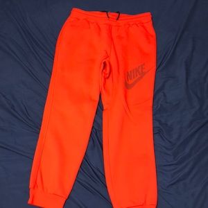 BRAND NEW, NEVER WORN Red Nike Joggers
